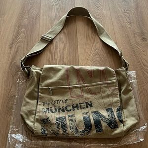 Large khaki canvas crossbody/messenger bag.